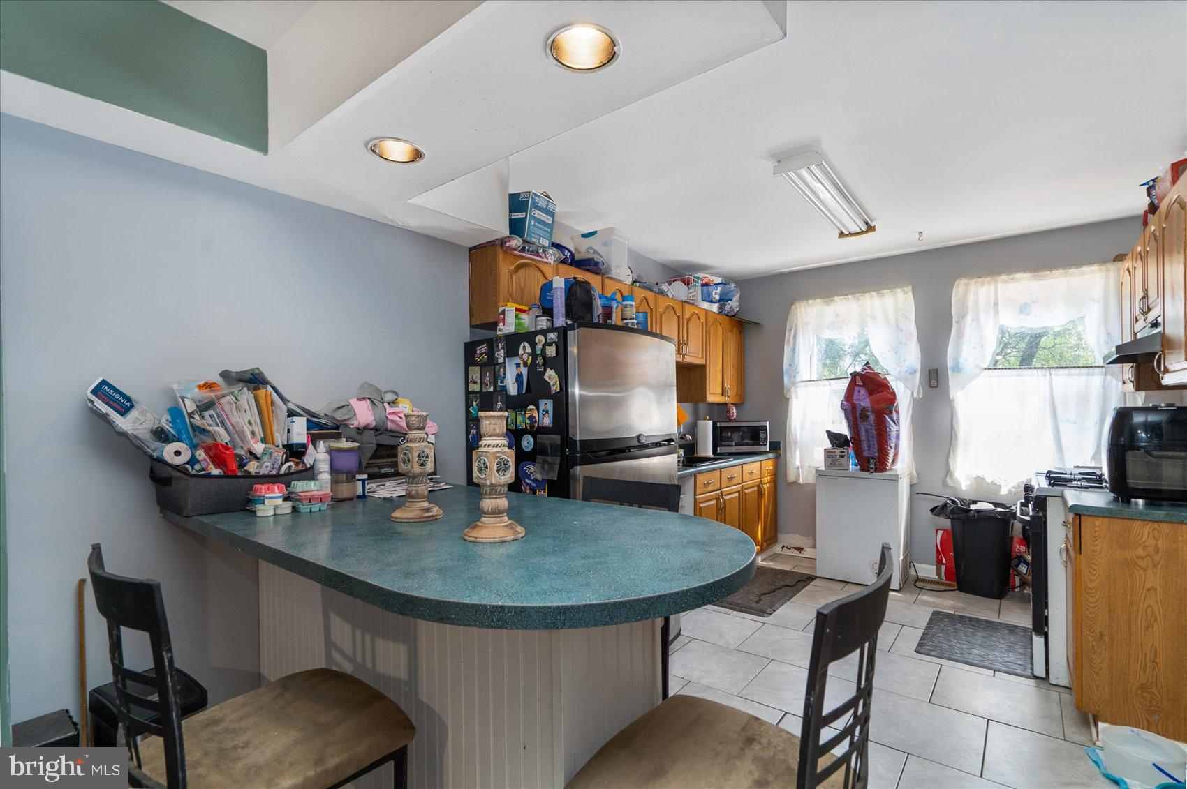 5219 Brookwood Road Baltimore, MD 21225 - Photo 8 of 38 Kitchen With Breakfast Area