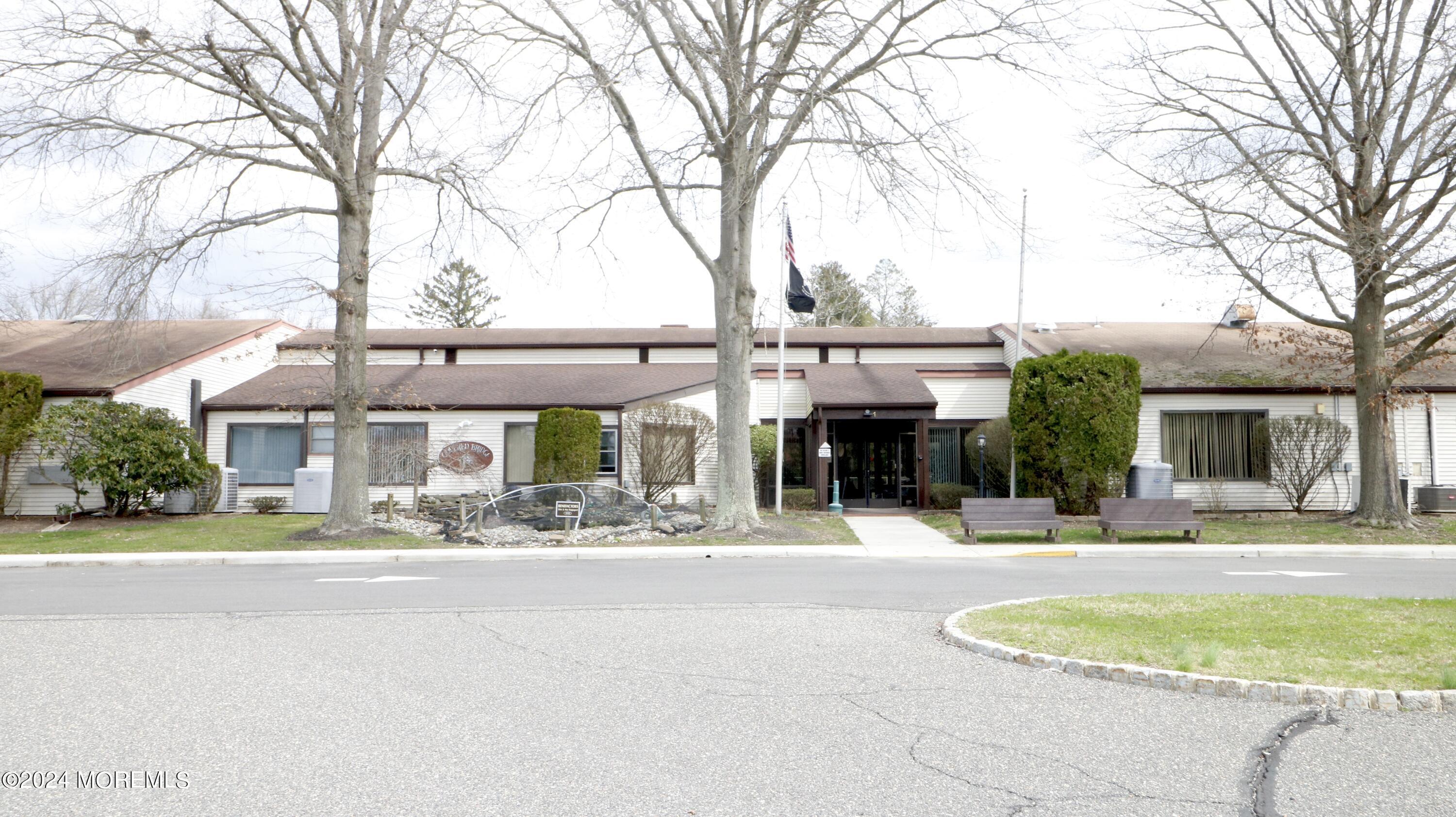 92 Arrowood Road, Unit K Manalapan, NJ 07726 - Photo 30 of 38 clubhouse fornt
