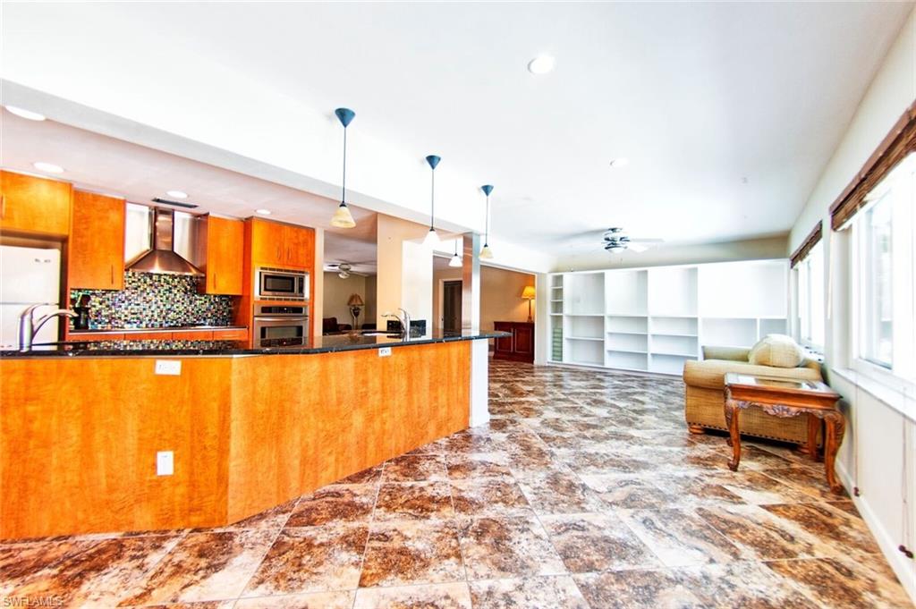 721 Springline Drive Naples, FL 34102 - Photo 3 of 7 a very nice looking room with a large window