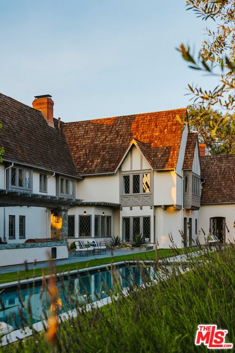 201 North Rossmore Avenue Los Angeles, CA 90004 - Photo 1 of 1 a front view of a house with swimming pool