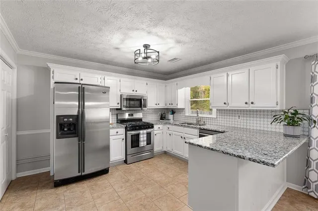 $325,000 | 900 Burning Bush Drive, Loganville, GA 30052