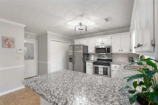 $325,000 | 900 Burning Bush Drive, Loganville, GA 30052