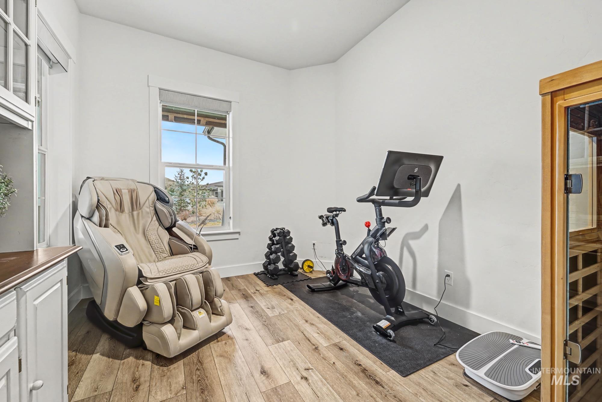 18357 North Burnt Car Way Boise, ID 83714 - Photo 42 of 48 Workout area featuring a relaxing sauna and hardwood / wood-style flooring