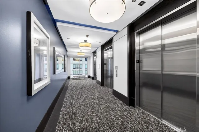 a view of a swimming pool with a lounge chairs