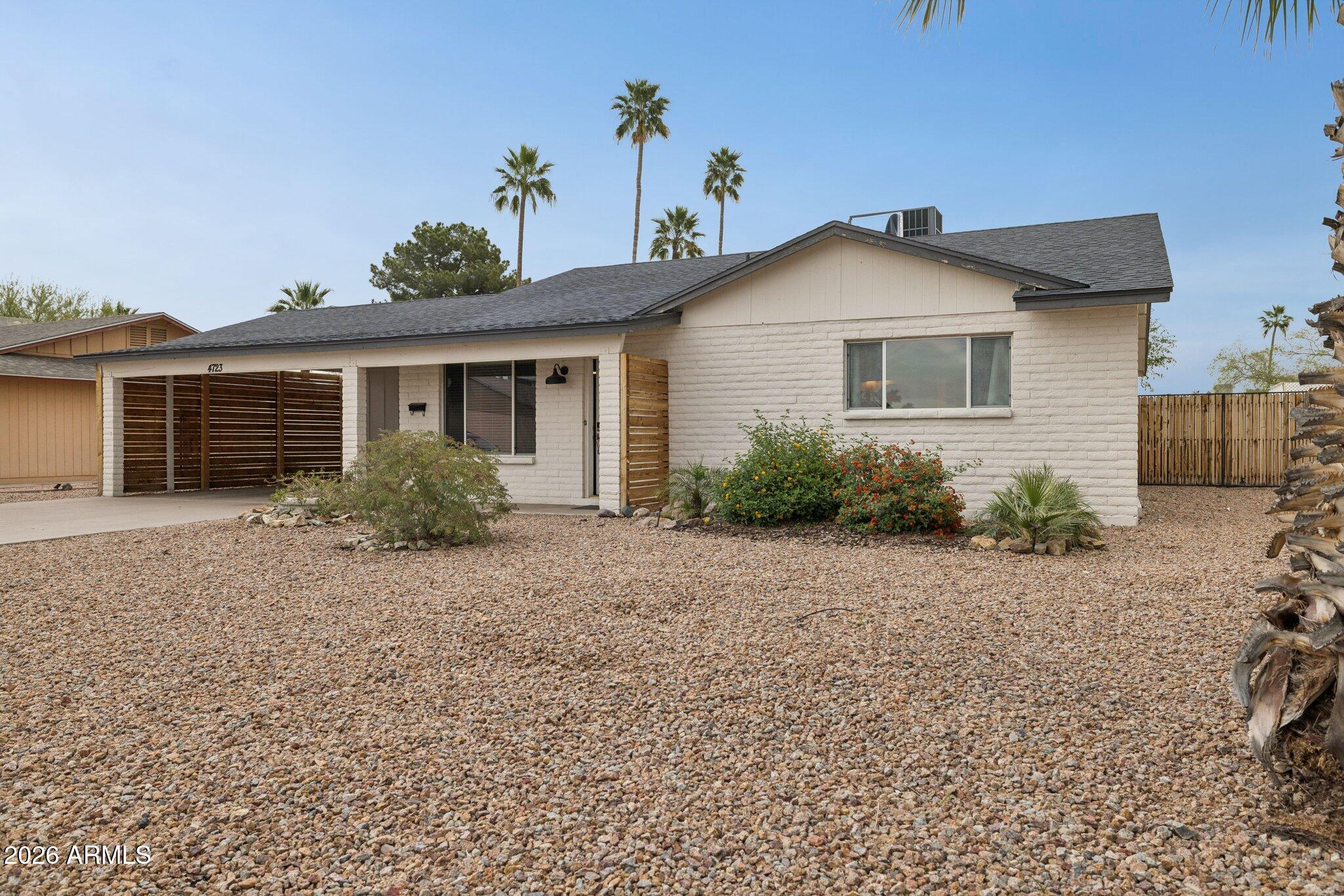 4723 South Country Club Way Tempe, AZ 85282 - Photo 1 of 46 a view of a house with a yard
