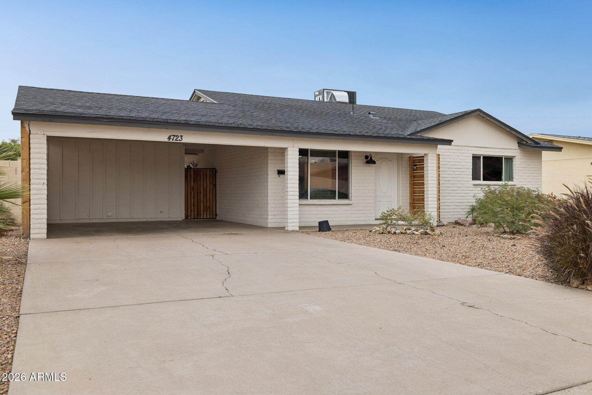 4723 South Country Club Way Tempe, AZ 85282 - Photo 3 of 46 a view of a house with a outdoor space