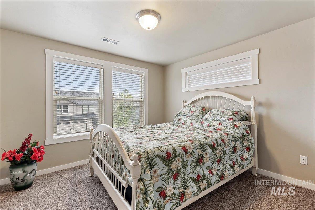1011 West Riodosa Drive Meridian, ID 83642 - Photo 26 of 38 Carpeted bedroom with baseboards