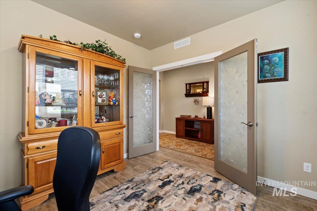 1011 West Riodosa Drive Meridian, ID 83642 - Photo 8 of 38 Office with light wood finished floors and french doors