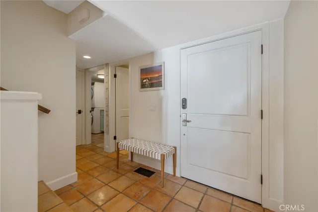 a bed room with a bed and a night stand