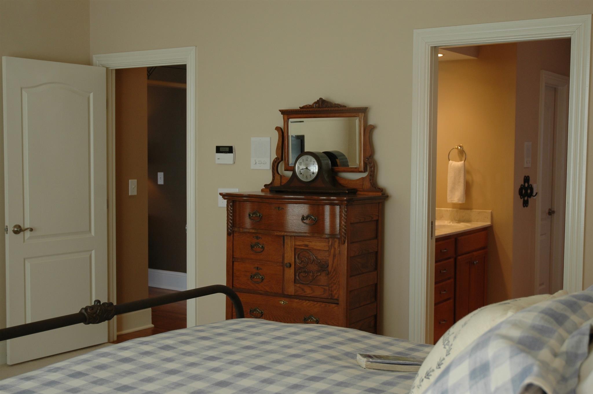 1604 Fair House Road Spring Hill, TN 37174 - Photo 11 of 18 a bedroom with a bed and a dresser