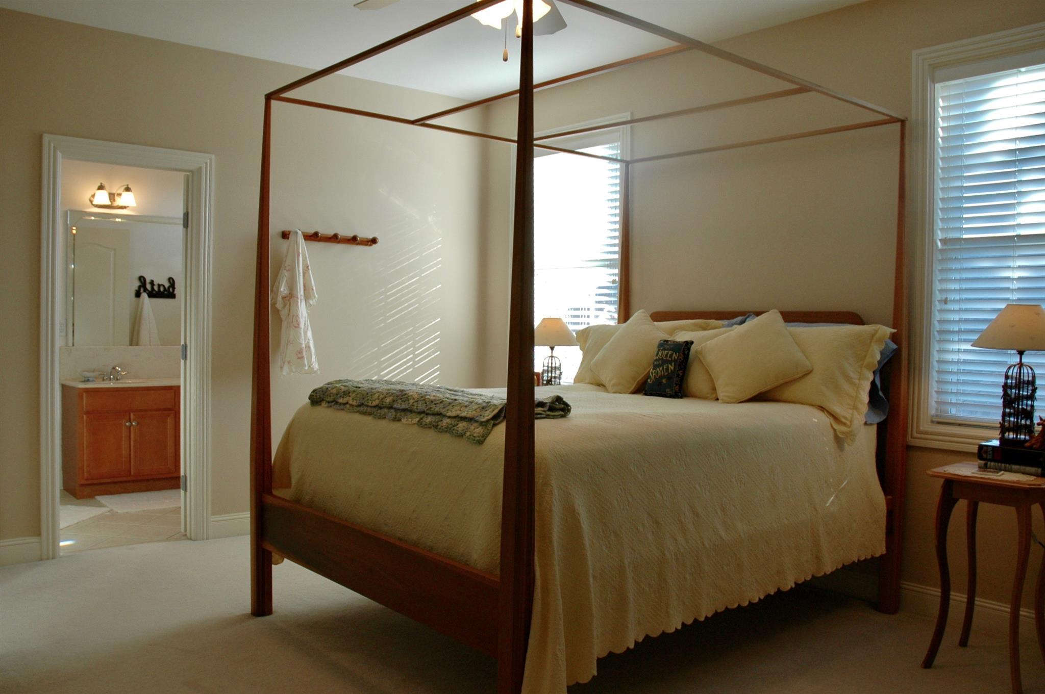 1604 Fair House Road Spring Hill, TN 37174 - Photo 12 of 18 a bedroom with a bed and a walk in closet