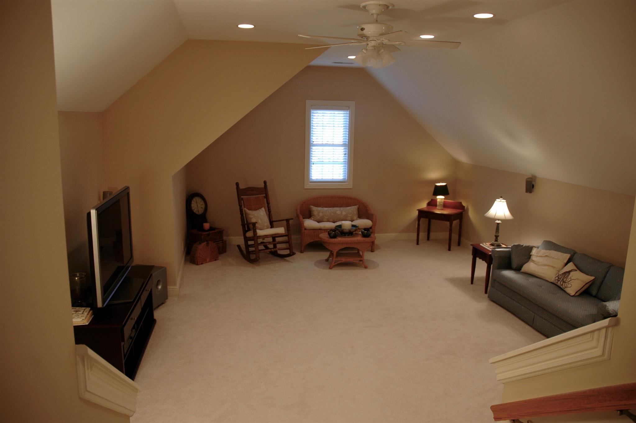 1604 Fair House Road Spring Hill, TN 37174 - Photo 15 of 18 a living room with furniture and a flat screen tv