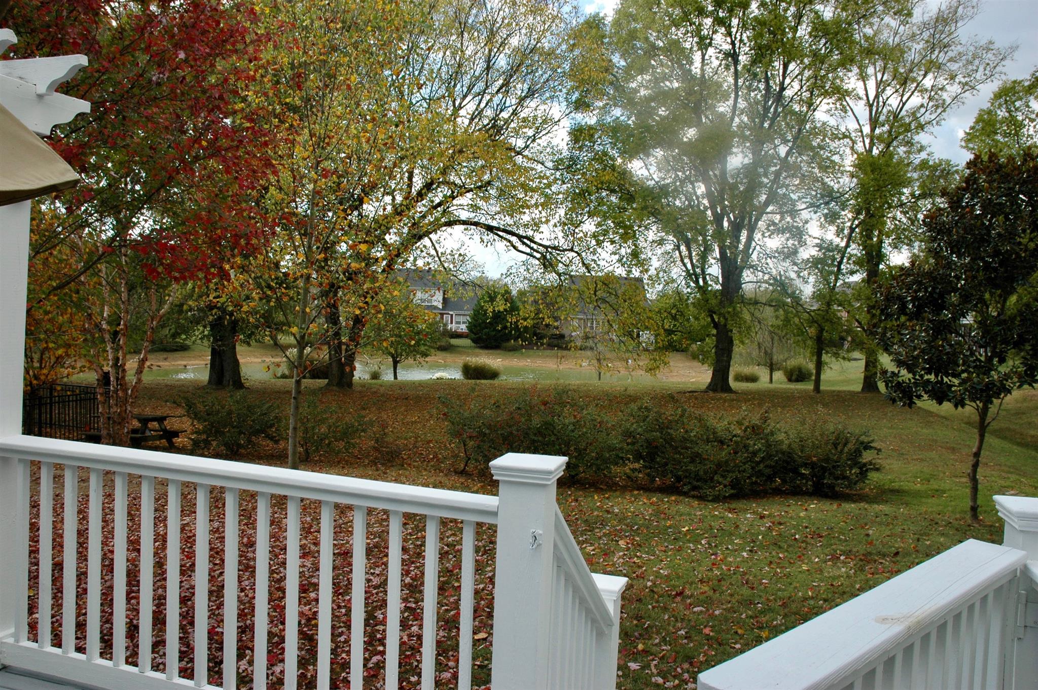 1604 Fair House Road Spring Hill, TN 37174 - Photo 16 of 18 a view of a wooden deck and lake