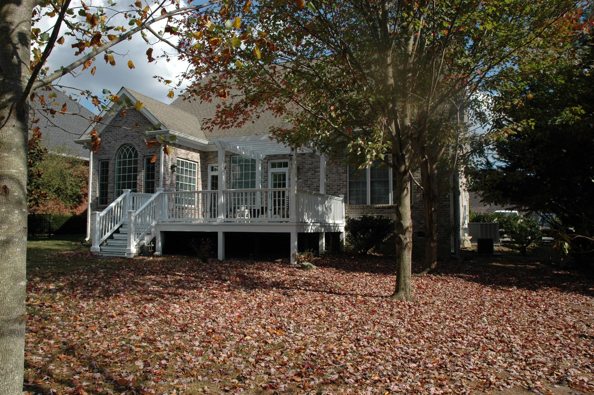 1604 Fair House Road Spring Hill, TN 37174 - Photo 18 of 18 a front view of a house with a garden