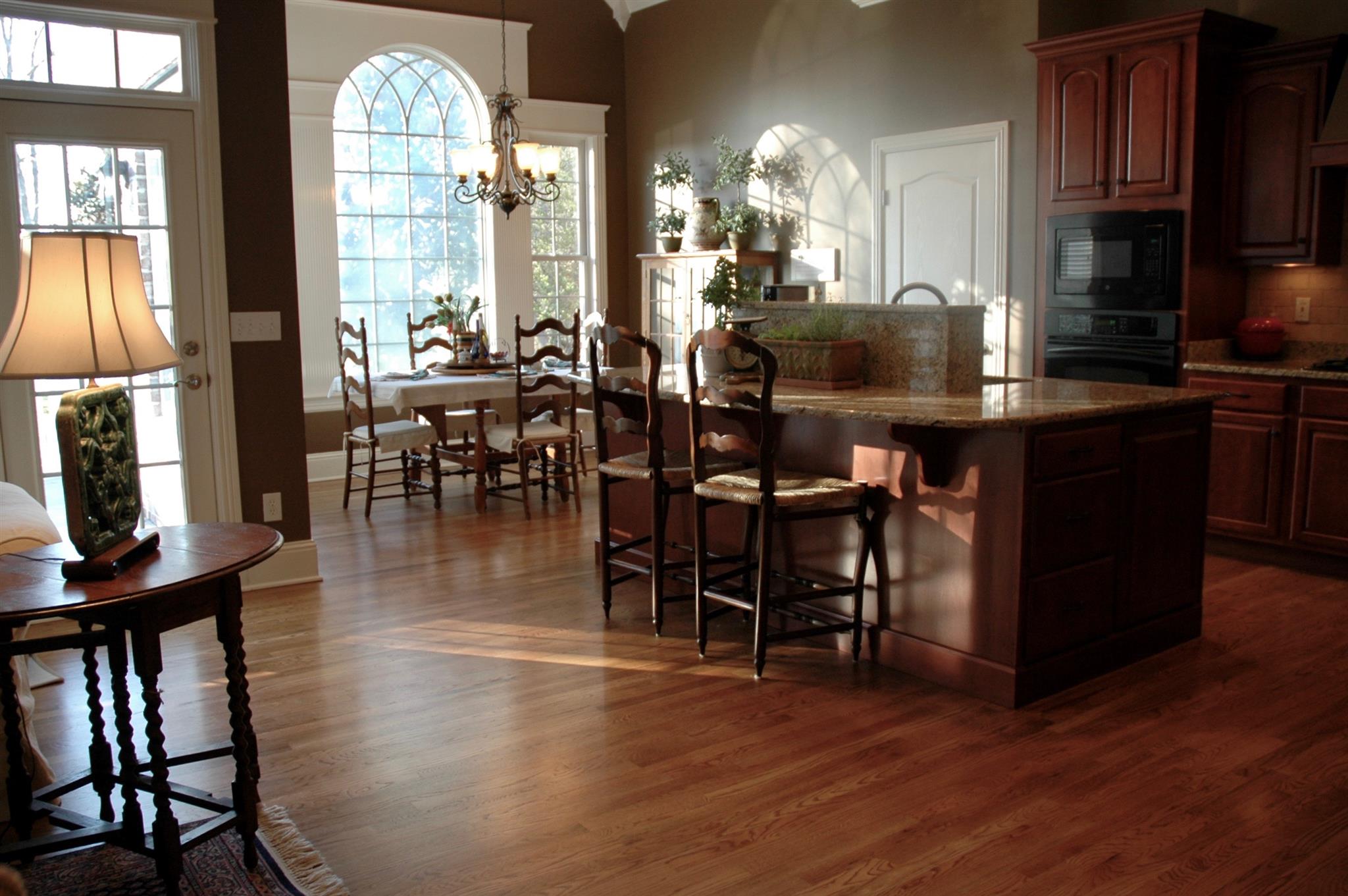 1604 Fair House Road Spring Hill, TN 37174 - Photo 5 of 18 a kitchen with lots of counter top space and dining table