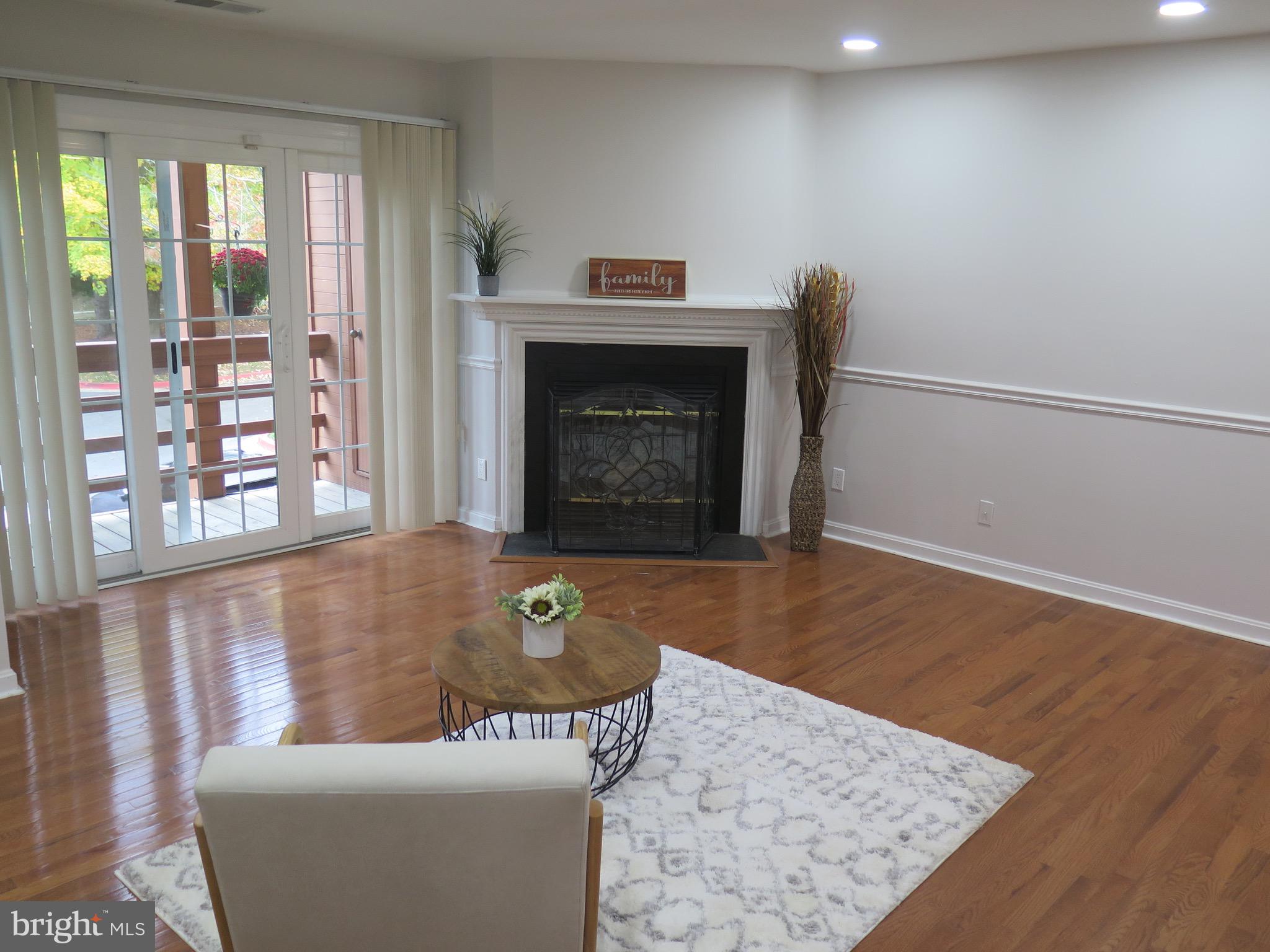 4952 Columbia Road, Unit 817 Columbia, MD 21044 - Photo 5 of 34 Family Room view w/Wood Burning Fireplace