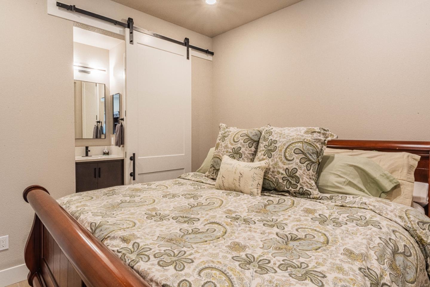 135 8th Street Marina, CA 93933 - Photo 17 of 69 a bedroom with a bed and a window