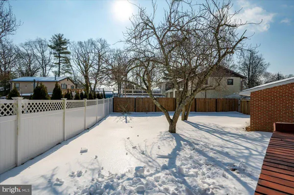 a view of a backyard patio
