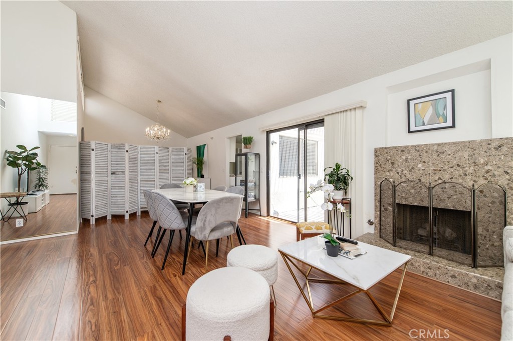 9 Morena, Unit 28 Irvine, CA 92612 - Photo 5 of 27 a dining room with furniture window and wooden floor