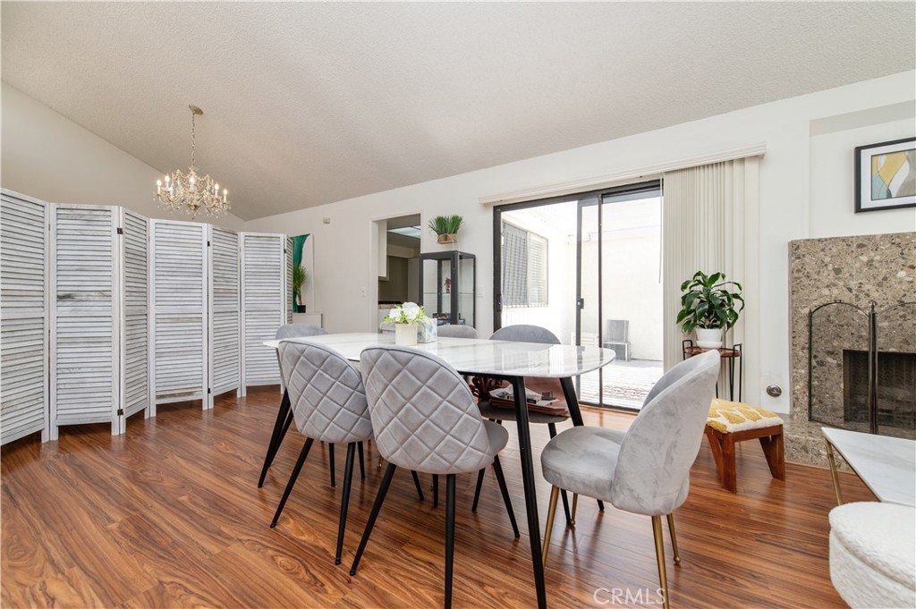 9 Morena, Unit 28 Irvine, CA 92612 - Photo 7 of 27 a view of a livingroom with furniture window and wooden floor
