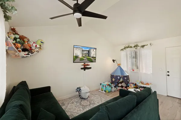 a living room with furniture and a couch