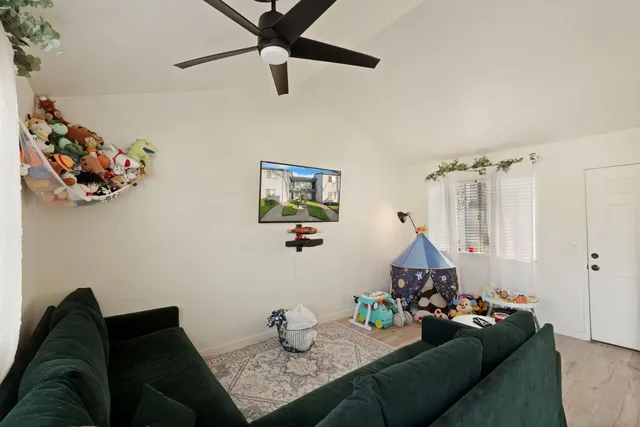 a living room with furniture and a couch