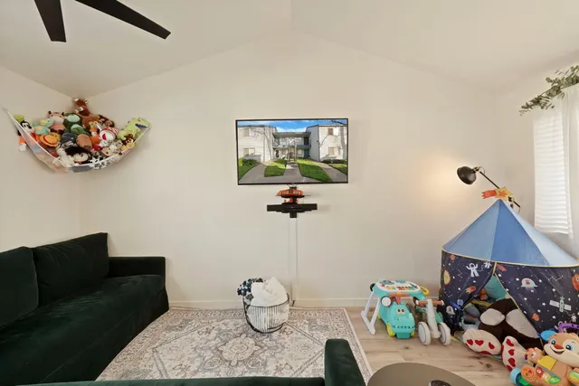 a living room with furniture and a couch