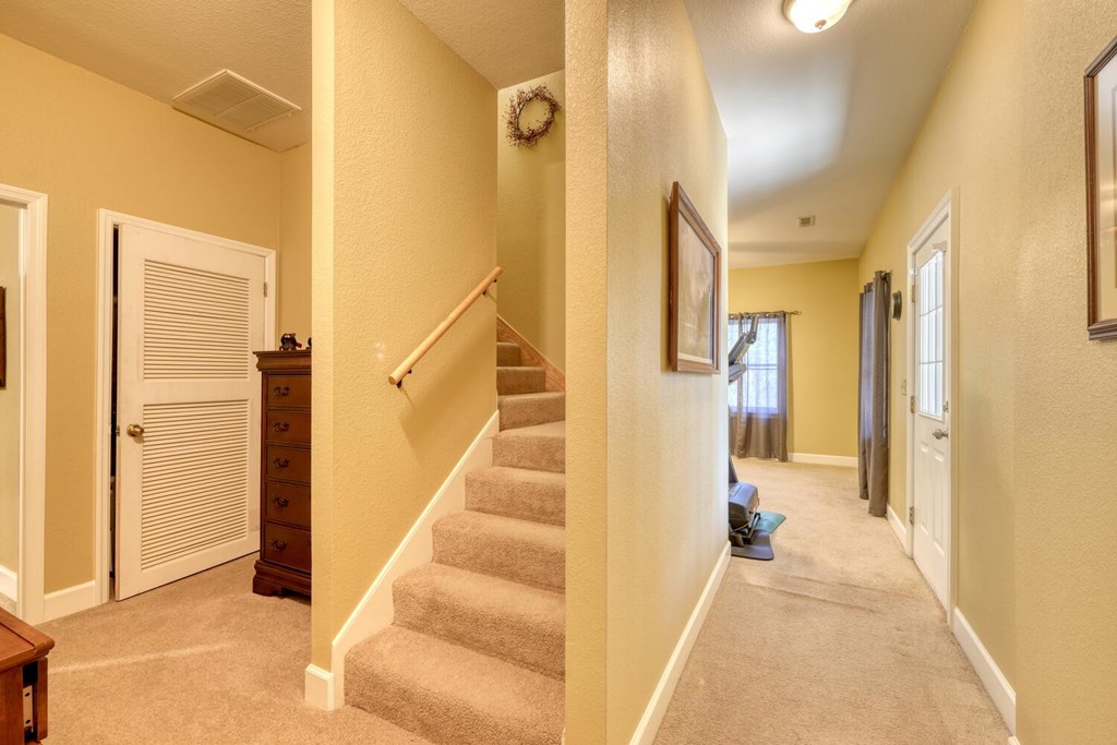 4852 Hf Lyons Road Hiawassee, GA 30546 - Photo 29 of 48 a view of a hallway with wooden floor and staircase