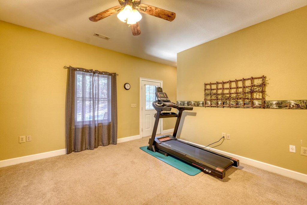 4852 Hf Lyons Road Hiawassee, GA 30546 - Photo 31 of 48 a room with gym equipment