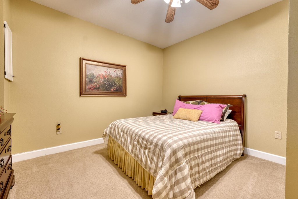 4852 Hf Lyons Road Hiawassee, GA 30546 - Photo 34 of 48 a bedroom with a bed and lamps