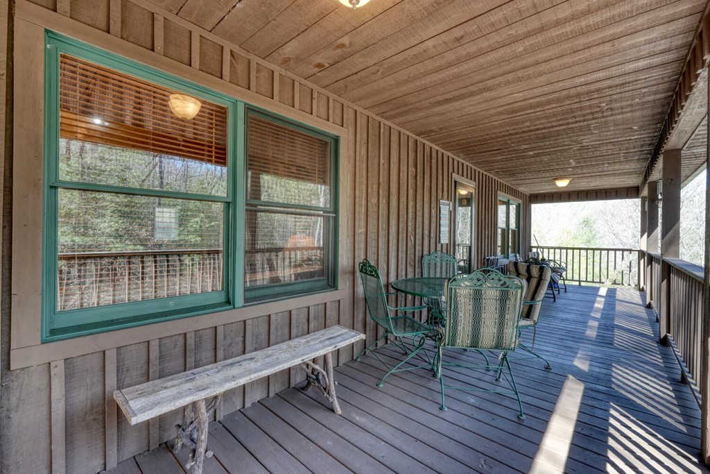 4852 Hf Lyons Road Hiawassee, GA 30546 - Photo 42 of 48 a view of a porch with wooden floor