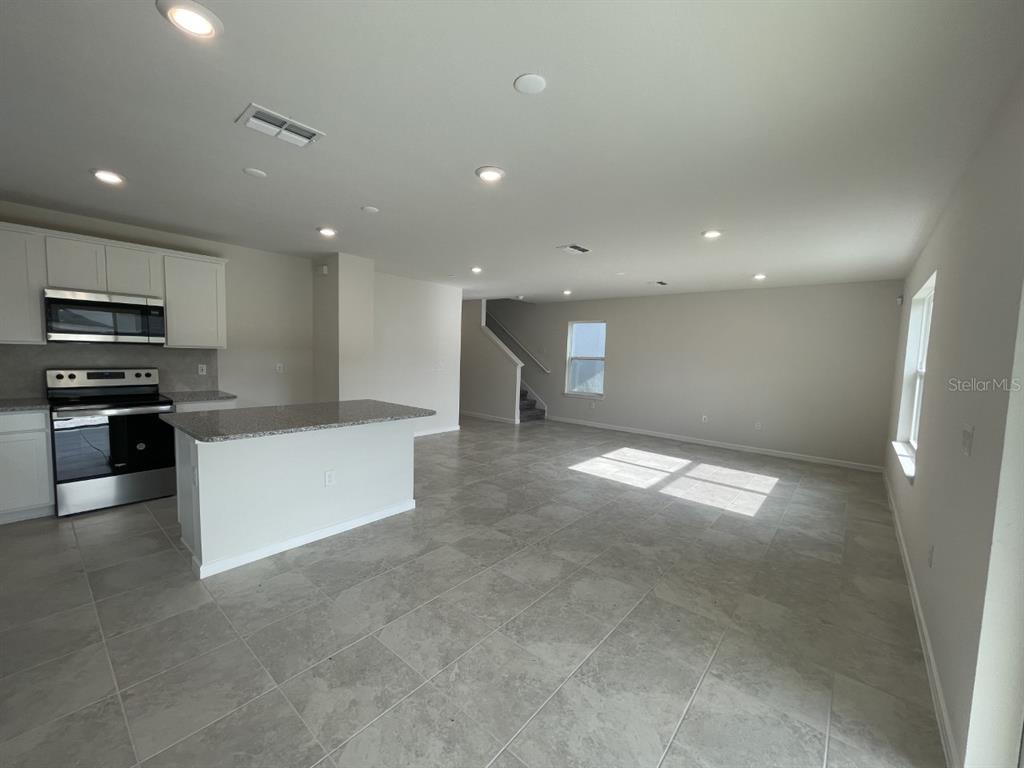 9469 Rally Spring Loop Wesley Chapel, FL 33545 - Photo 7 of 24 Gallery Image 7