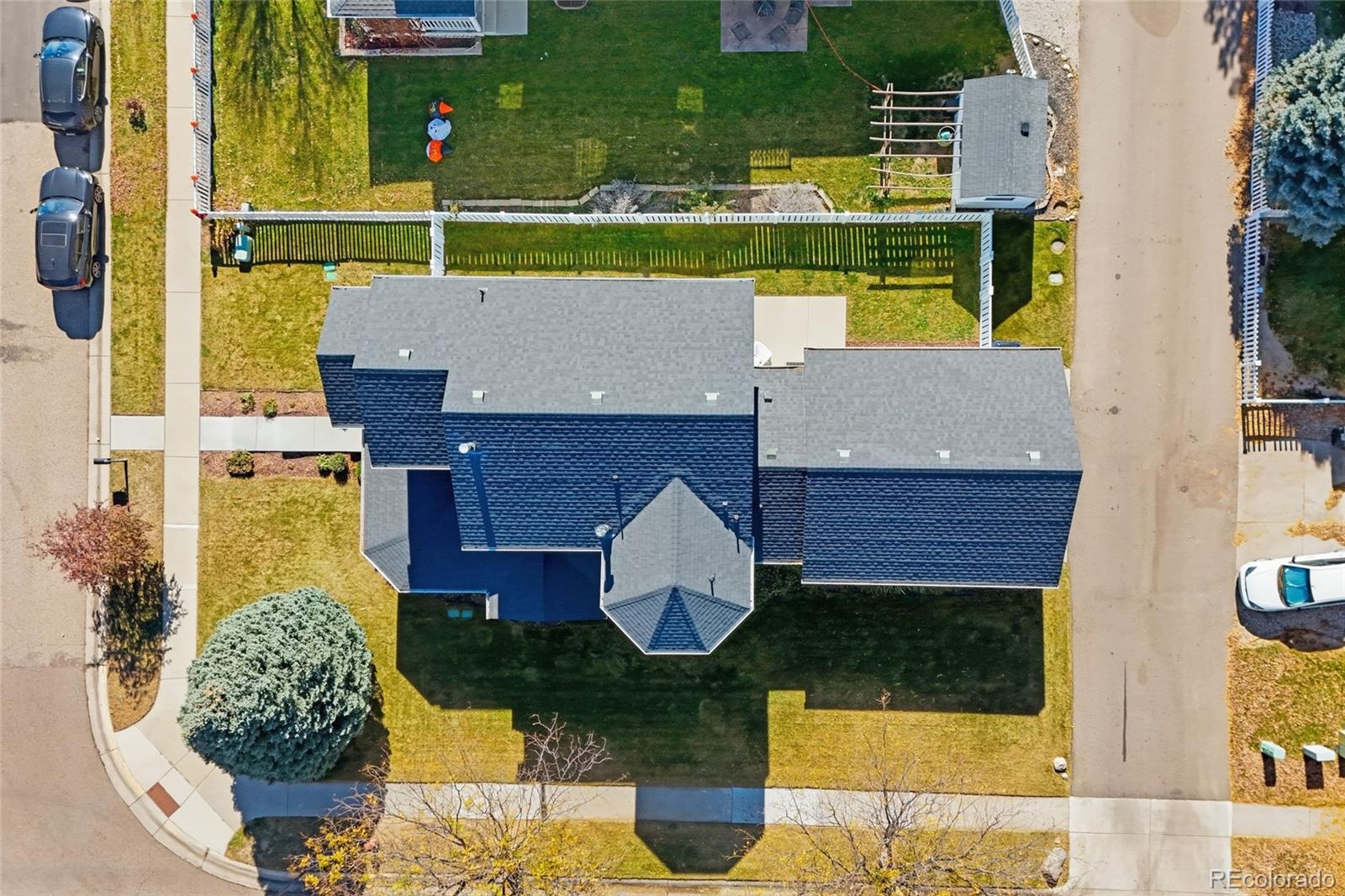 1229 Founders Circle Windsor, CO 80550 - Photo 39 of 45 a front view of a house with swimming pool