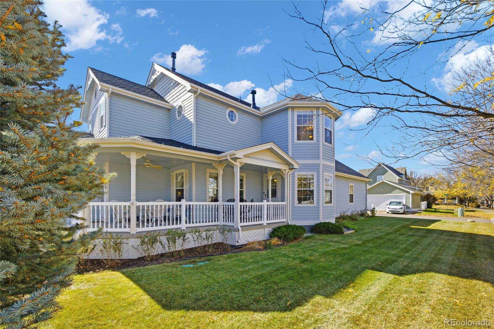 1229 Founders Circle Windsor, CO 80550 - Photo 43 of 45 a view of a house with a yard