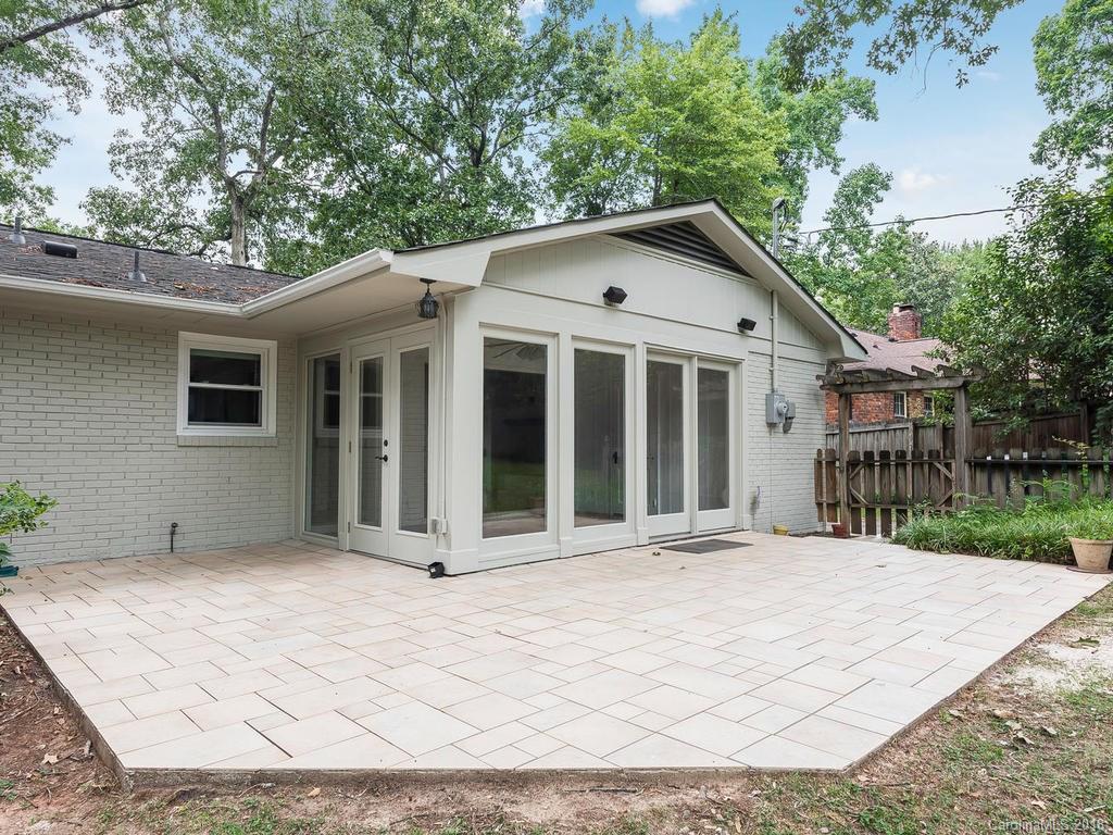 4801 Fairheath Road Charlotte, NC 28210 - Photo 21 of 25 a front view of a house with a porch