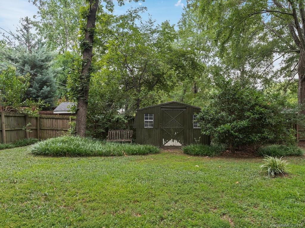 4801 Fairheath Road Charlotte, NC 28210 - Photo 24 of 25 a green field covered with tall trees