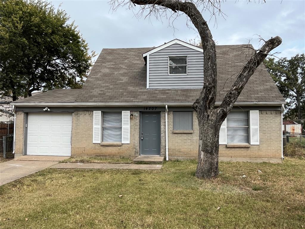 View of front of home with brick siding, concrete driveway, a garage, and a shingled roof