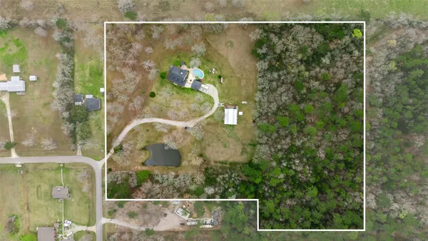 $975,000 | 7000 Woodland Lakes Drive, Willis, TX 77378