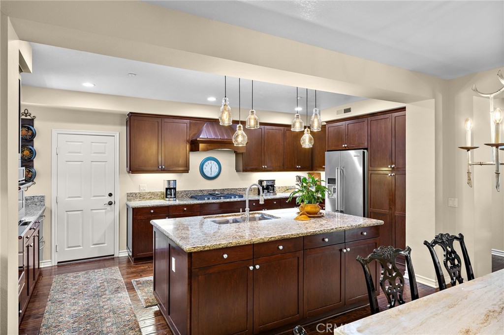 37 Tuscany Ladera Ranch, CA 92694 - Photo 13 of 53 a kitchen with a sink stove and refrigerator