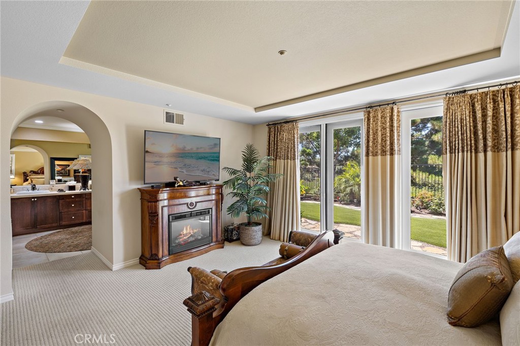 37 Tuscany Ladera Ranch, CA 92694 - Photo 20 of 53 a bedroom with a bed and a large window