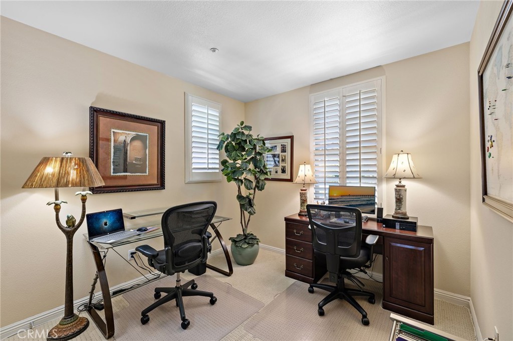 37 Tuscany Ladera Ranch, CA 92694 - Photo 26 of 53 a view of a workspace with furniture and a window