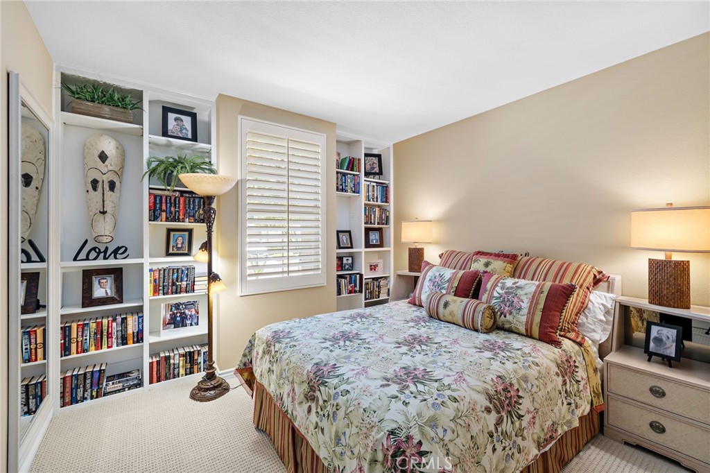 37 Tuscany Ladera Ranch, CA 92694 - Photo 27 of 53 a bedroom with a bed and closet