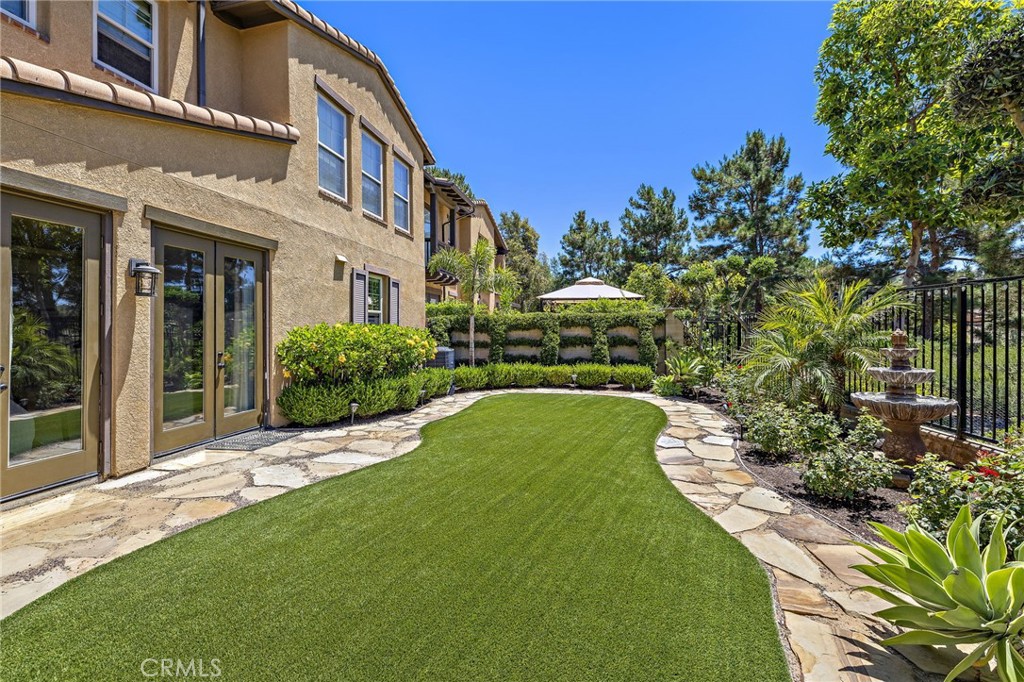 37 Tuscany Ladera Ranch, CA 92694 - Photo 30 of 53 a view of a house with a yard