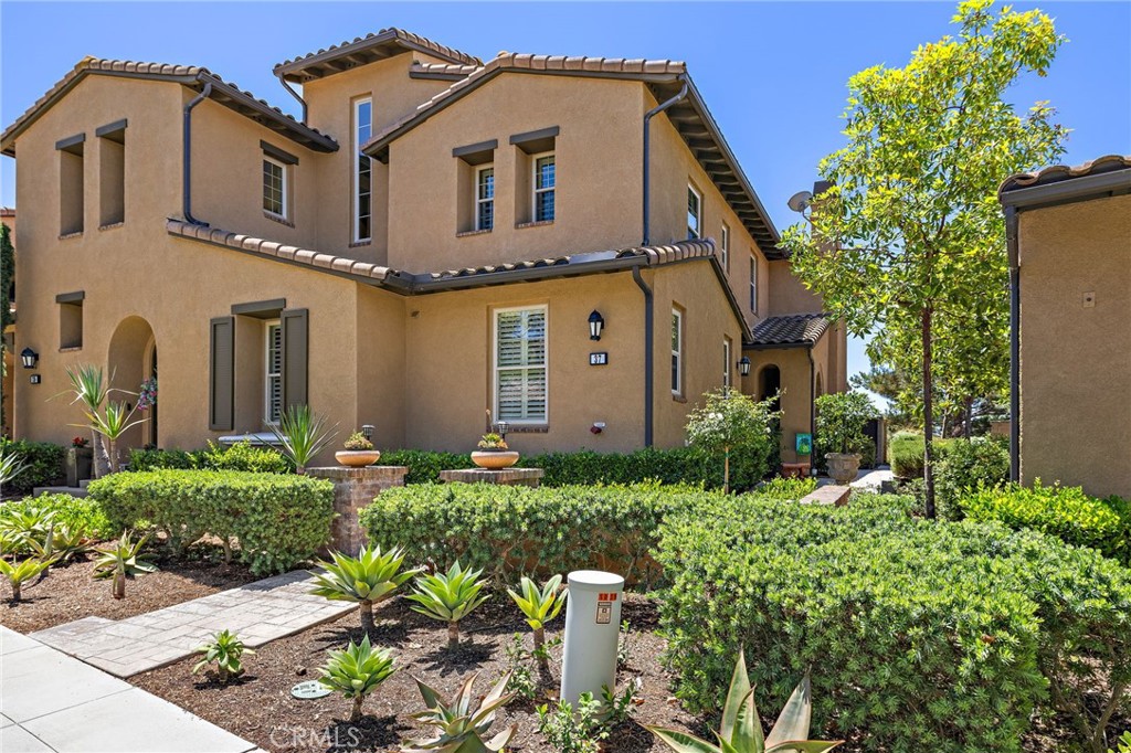 37 Tuscany Ladera Ranch, CA 92694 - Photo 3 of 53 a front view of a house with a yard