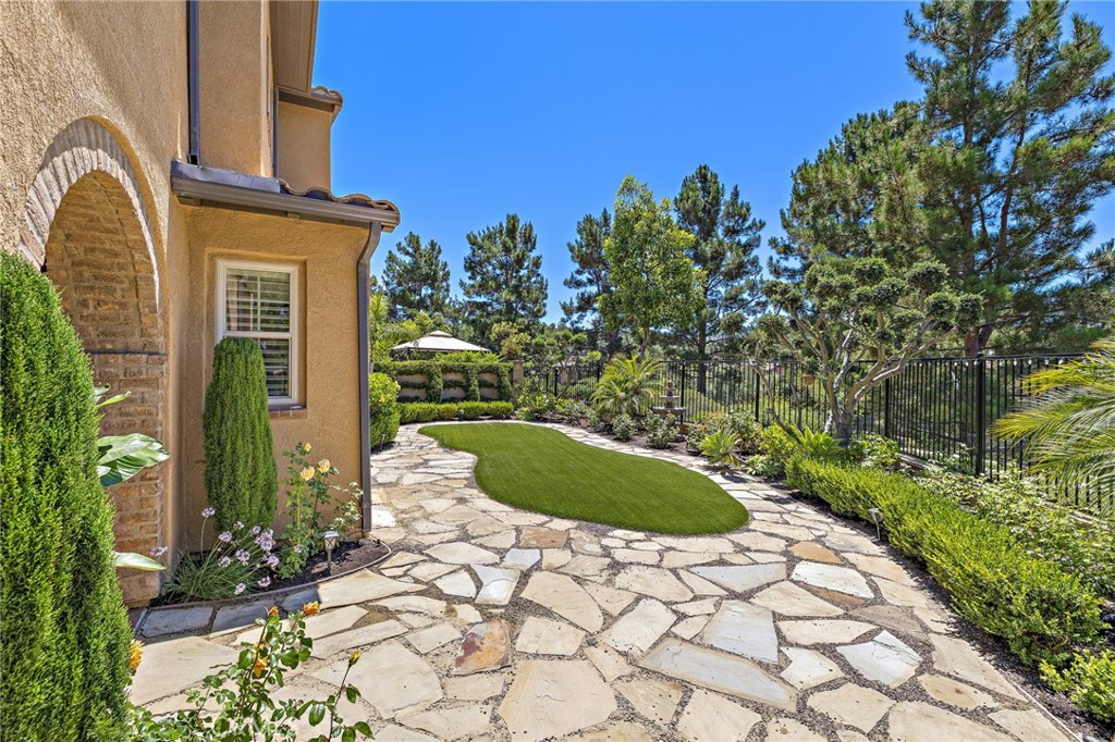 37 Tuscany Ladera Ranch, CA 92694 - Photo 32 of 53 a front view of a house with a yard