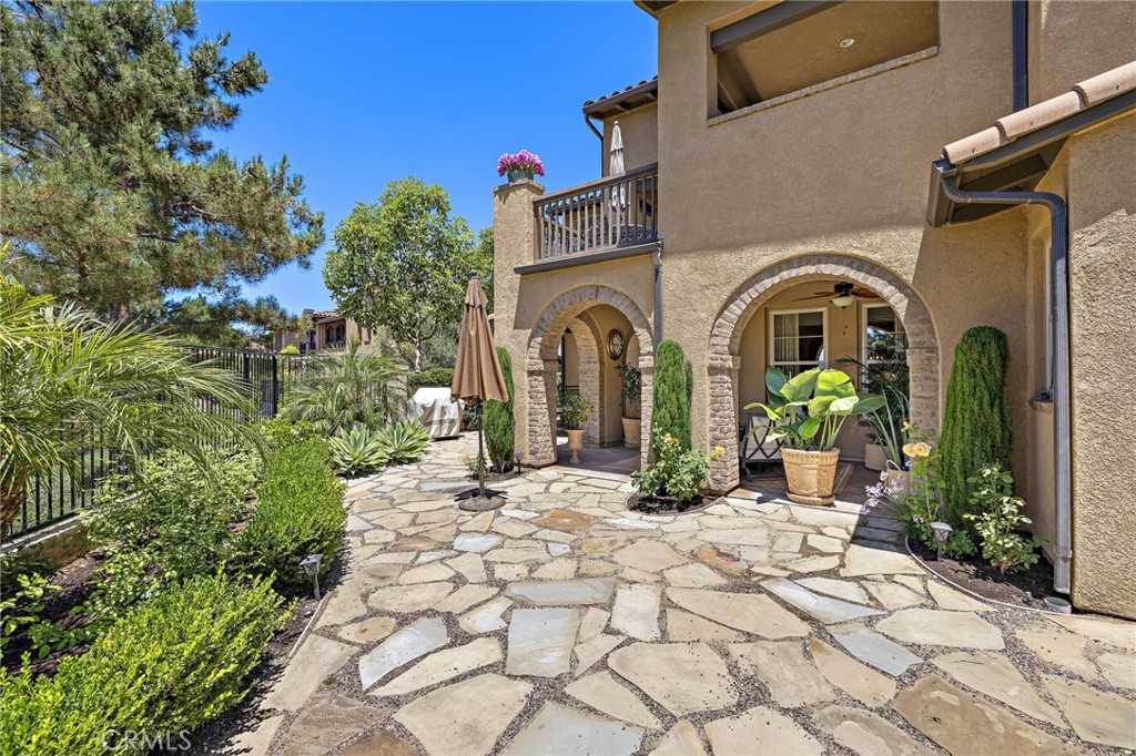 37 Tuscany Ladera Ranch, CA 92694 - Photo 35 of 53 a view of a grey house with large windows