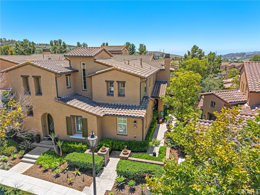 37 Tuscany Ladera Ranch, CA 92694 - Photo 38 of 53 a front view of a house with a yard