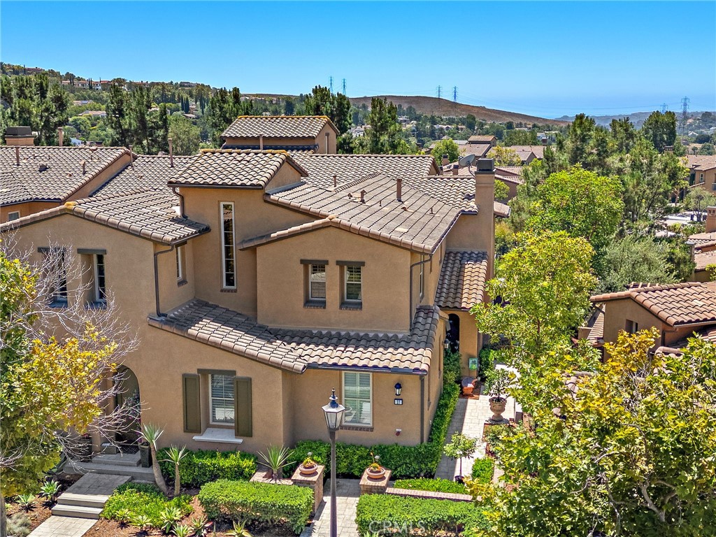 37 Tuscany Ladera Ranch, CA 92694 - Photo 39 of 53 aerial view of a house with a yard and potted plants