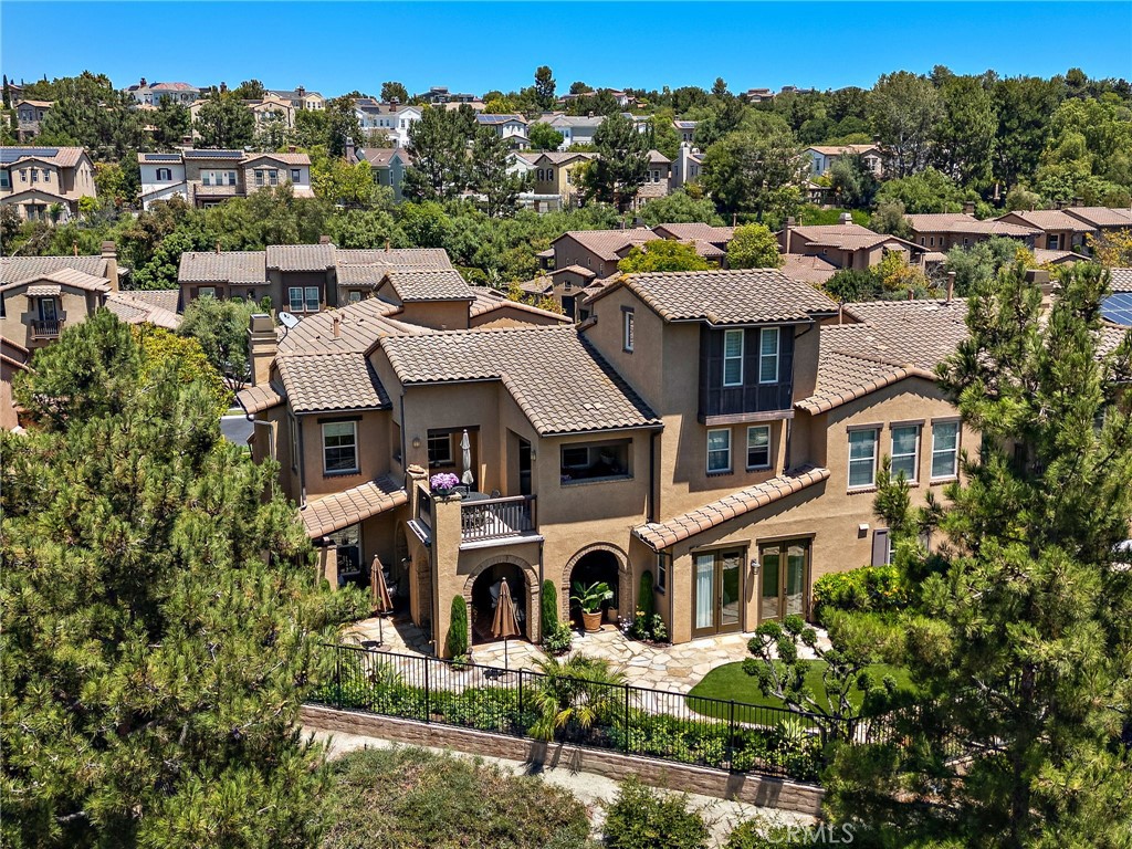 37 Tuscany Ladera Ranch, CA 92694 - Photo 43 of 53 an aerial view of a house with a garden and trees