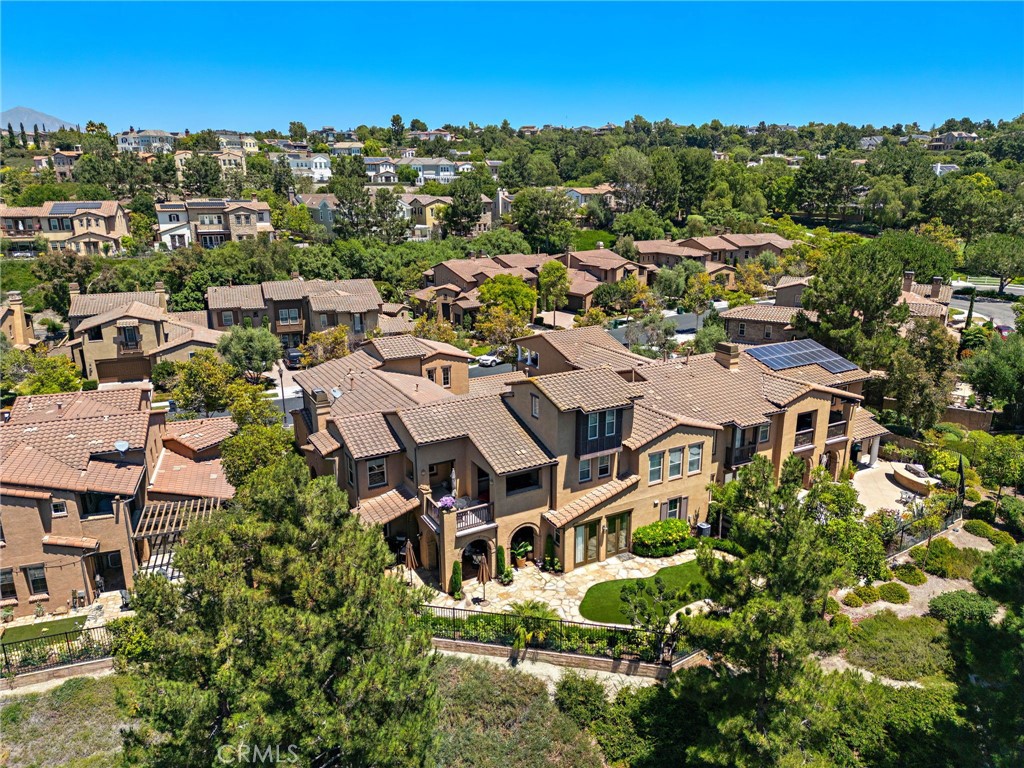37 Tuscany Ladera Ranch, CA 92694 - Photo 44 of 53 an aerial view of residential building with parking and yard